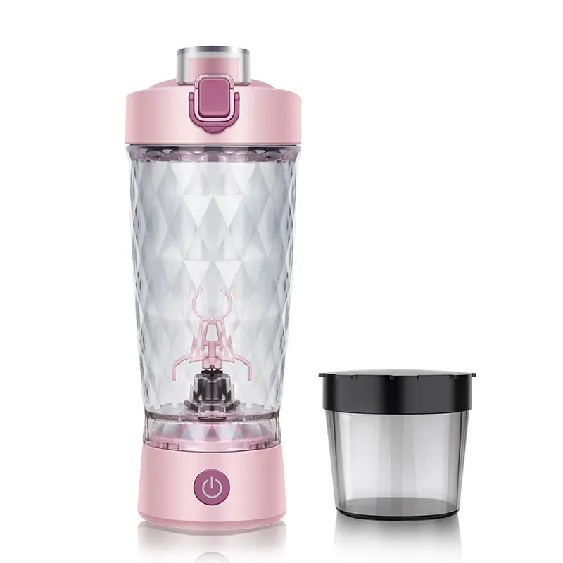 Pink electric protein shaker bottle with diamond-cut body and powder storage compartment